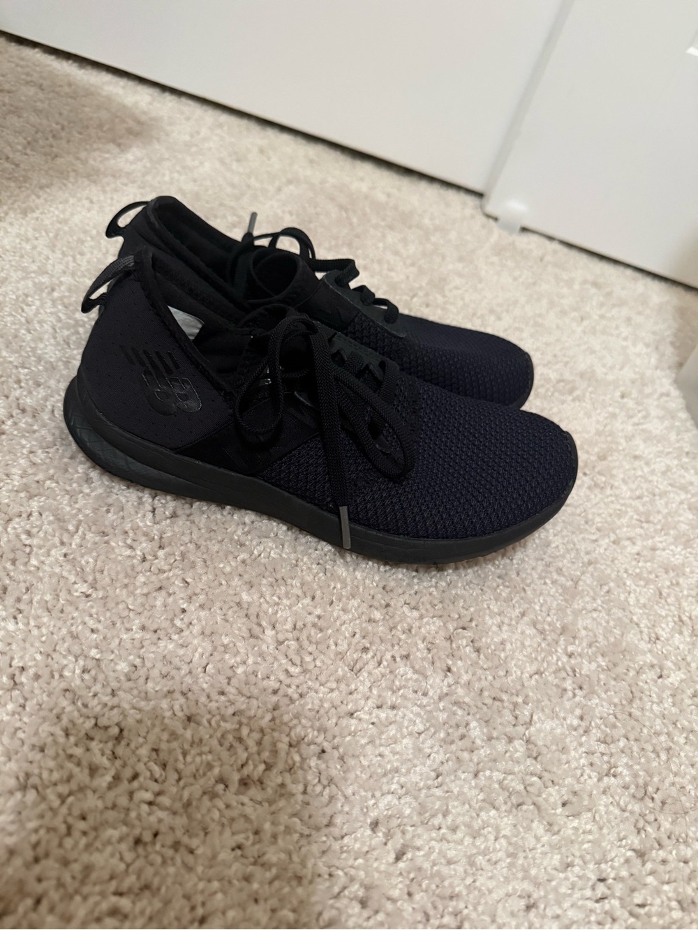 New Balance womens Black Knit Athletic Sneakers